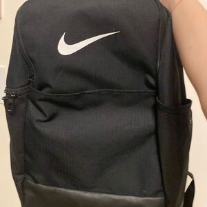 Really good condition strong and durable black  Nike backpack